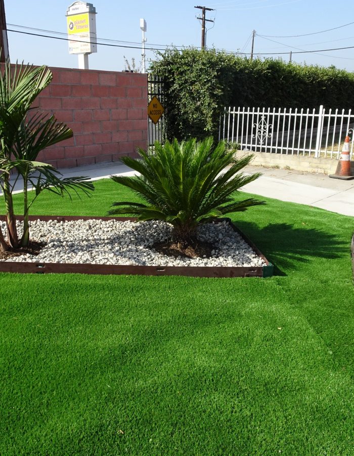 Installation of Artificial turf, planters and plants