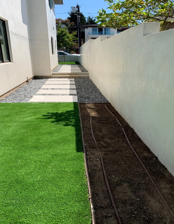 Installation of Artificial turf, planters, tree and irrigation system 