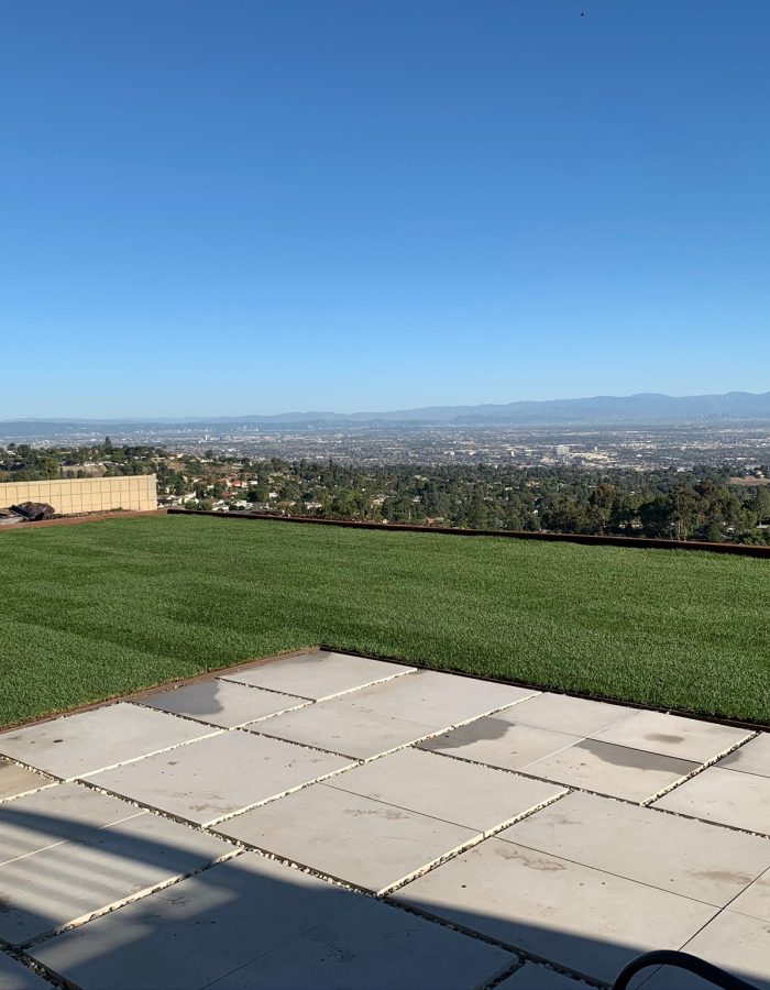 Installation of Stepping Stones, Sod, Irrigation system and planters 